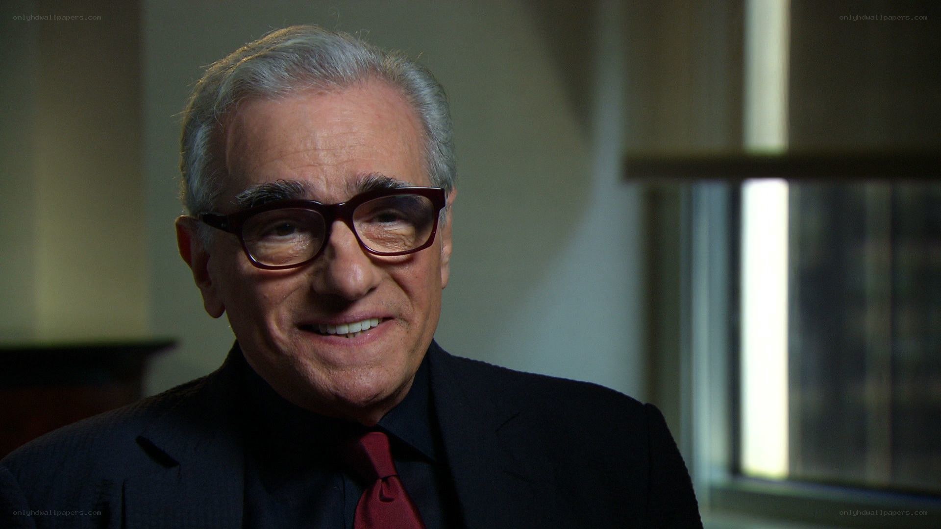 man in suit and glasses