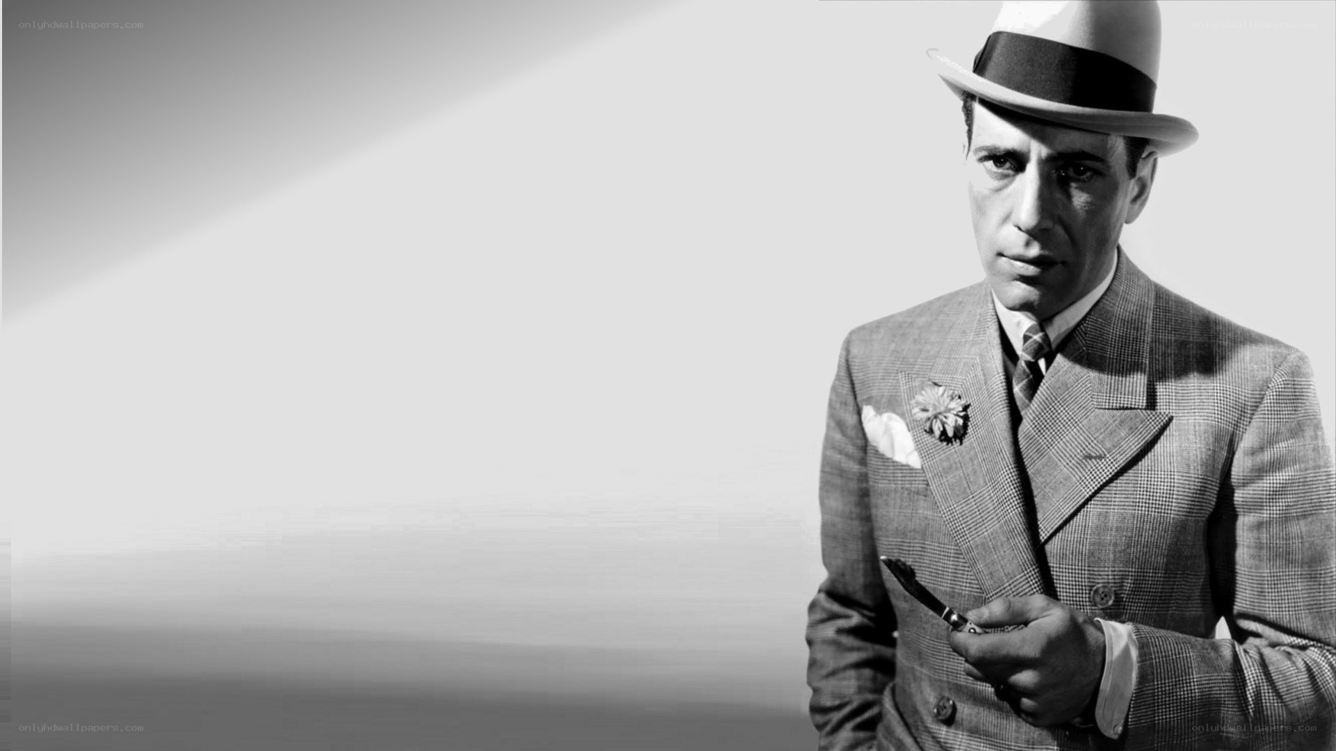 man in suit and hat