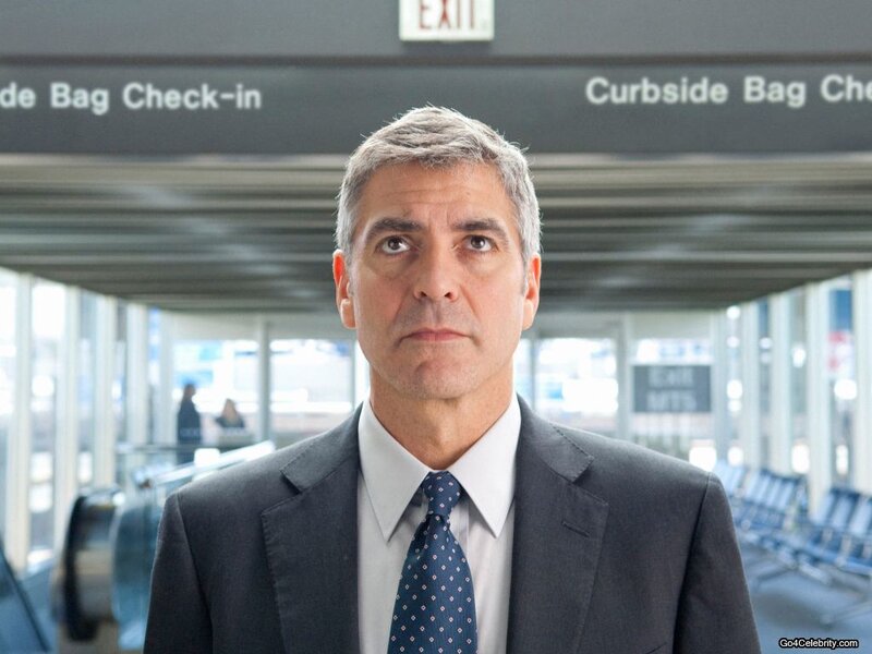 Man in Suit at Airport — Gray, Serious