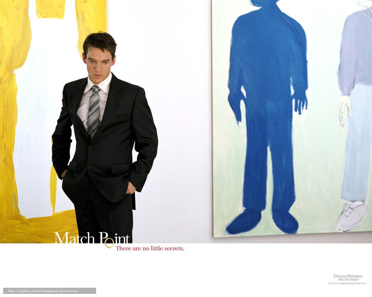 Man in suit at art gallery
