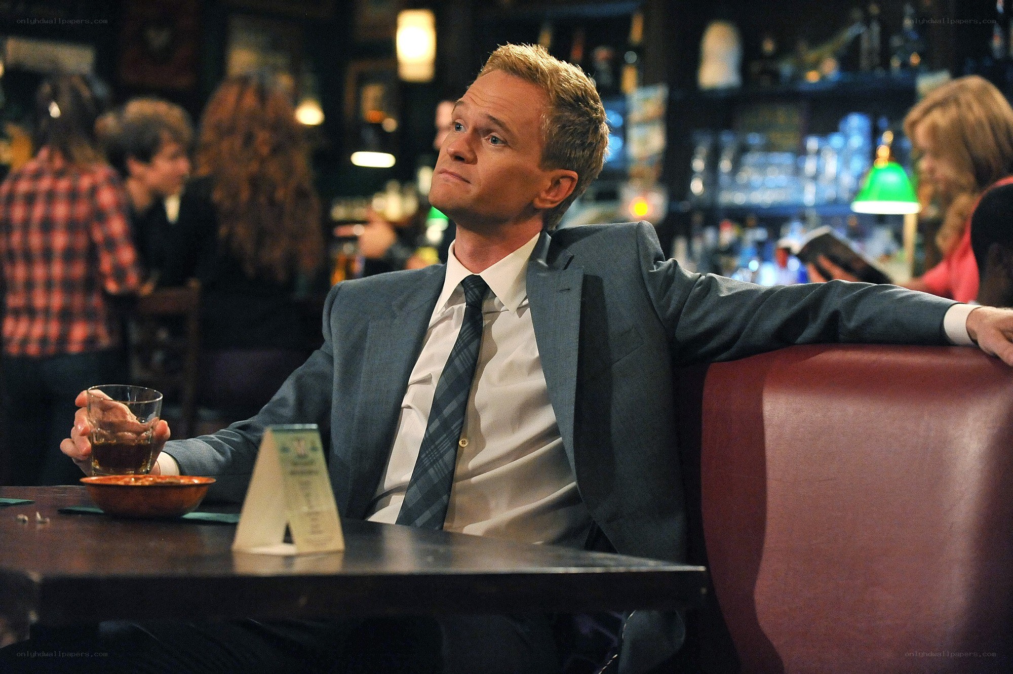 Man in suit at bar