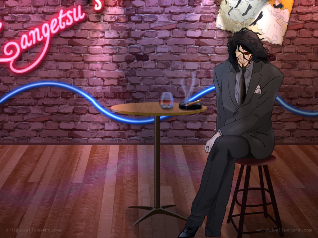 man in suit at bar