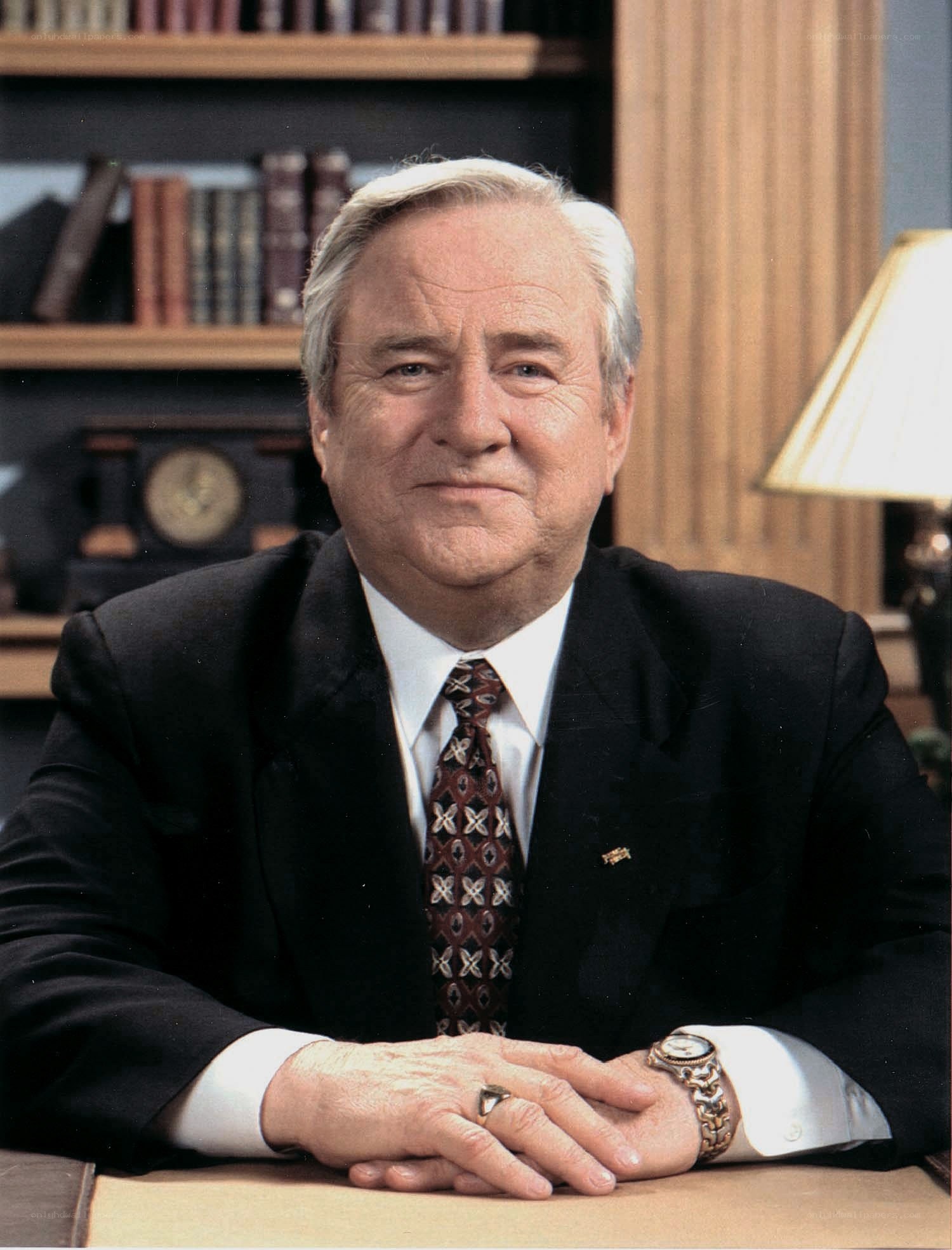 Man in suit at desk