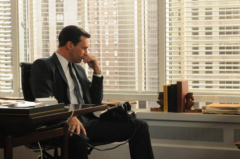 Man in Suit at Desk — Black, Contemplative