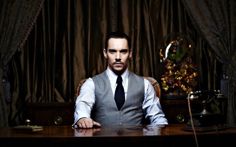 Man in Suit at Desk — Brown, Dramatic, Photograph