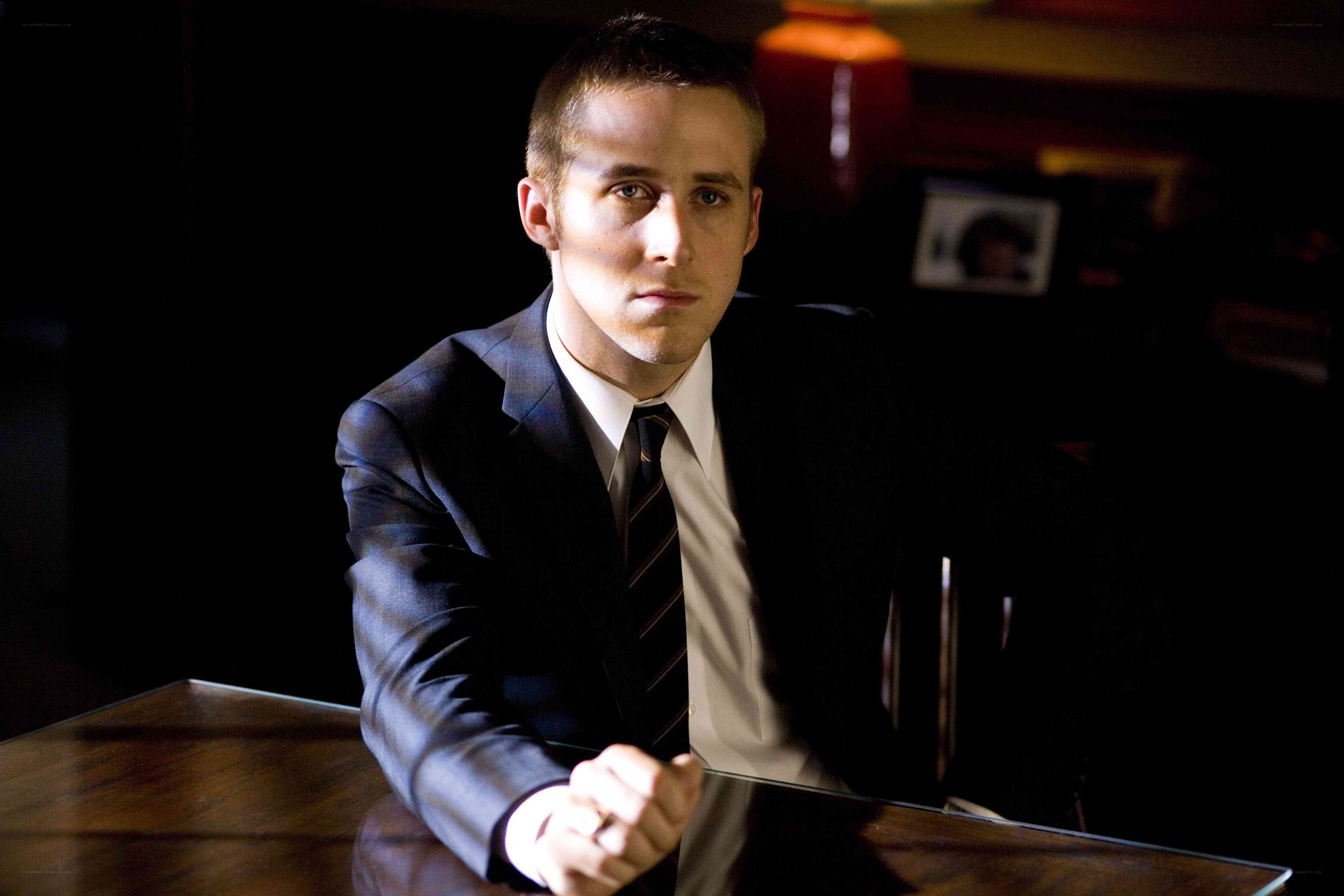 man in suit at desk