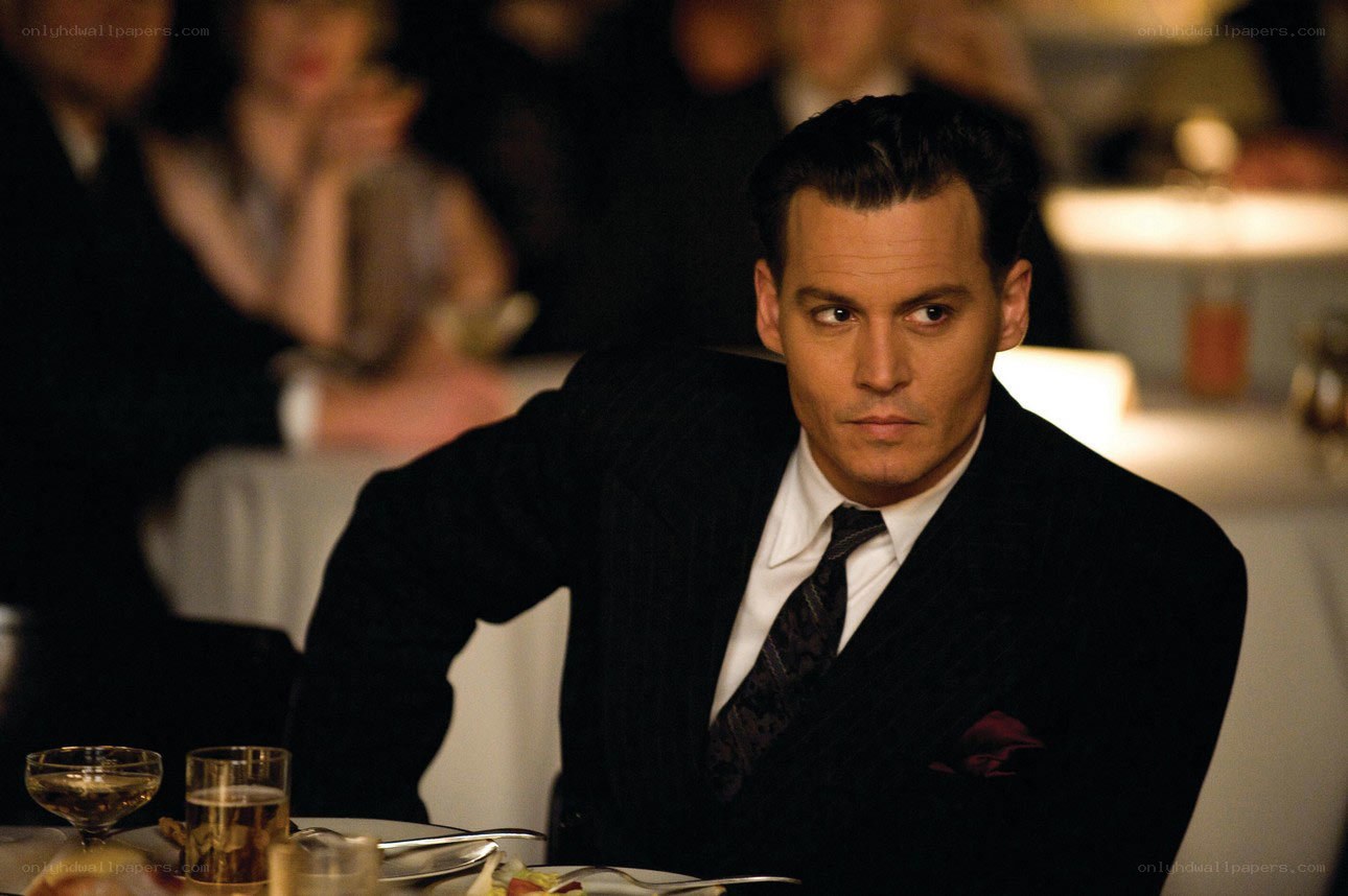 man in suit at dinner