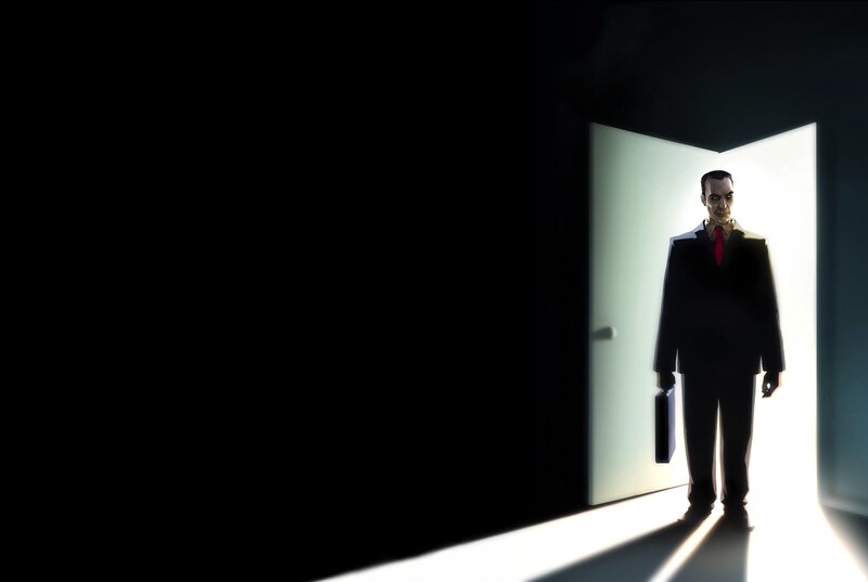 man in suit at doorway