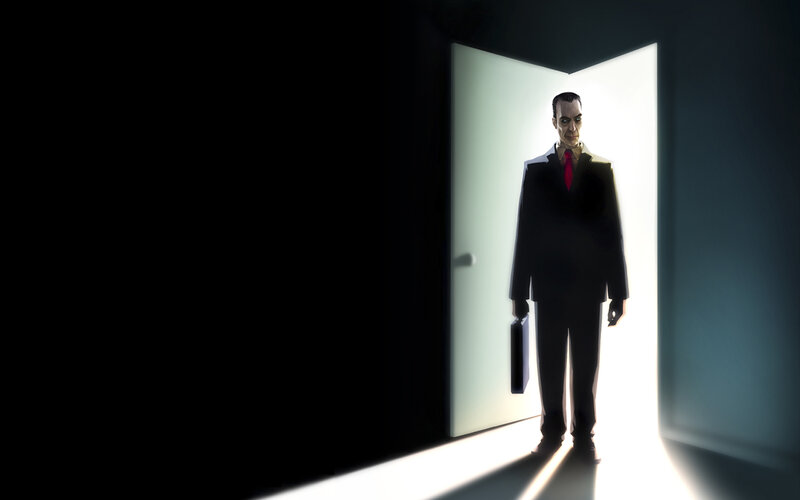 man in suit at doorway