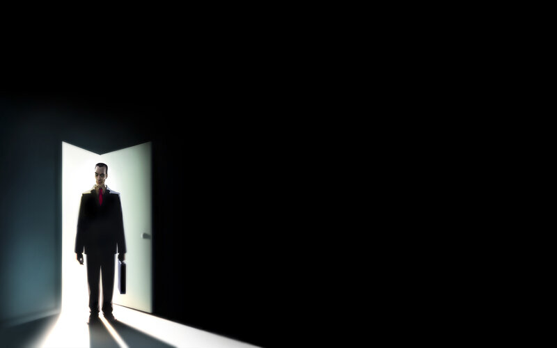 man in suit at doorway