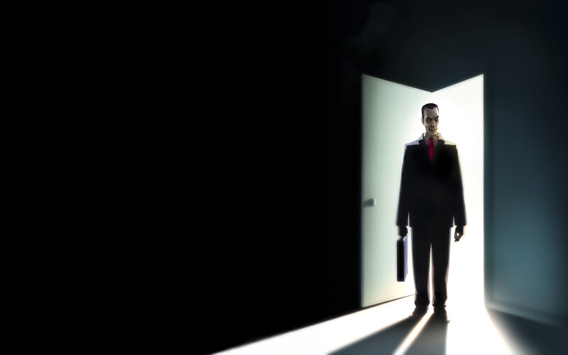 man in suit at doorway