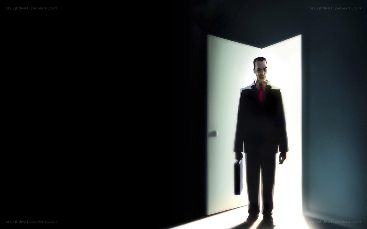 man in suit at doorway