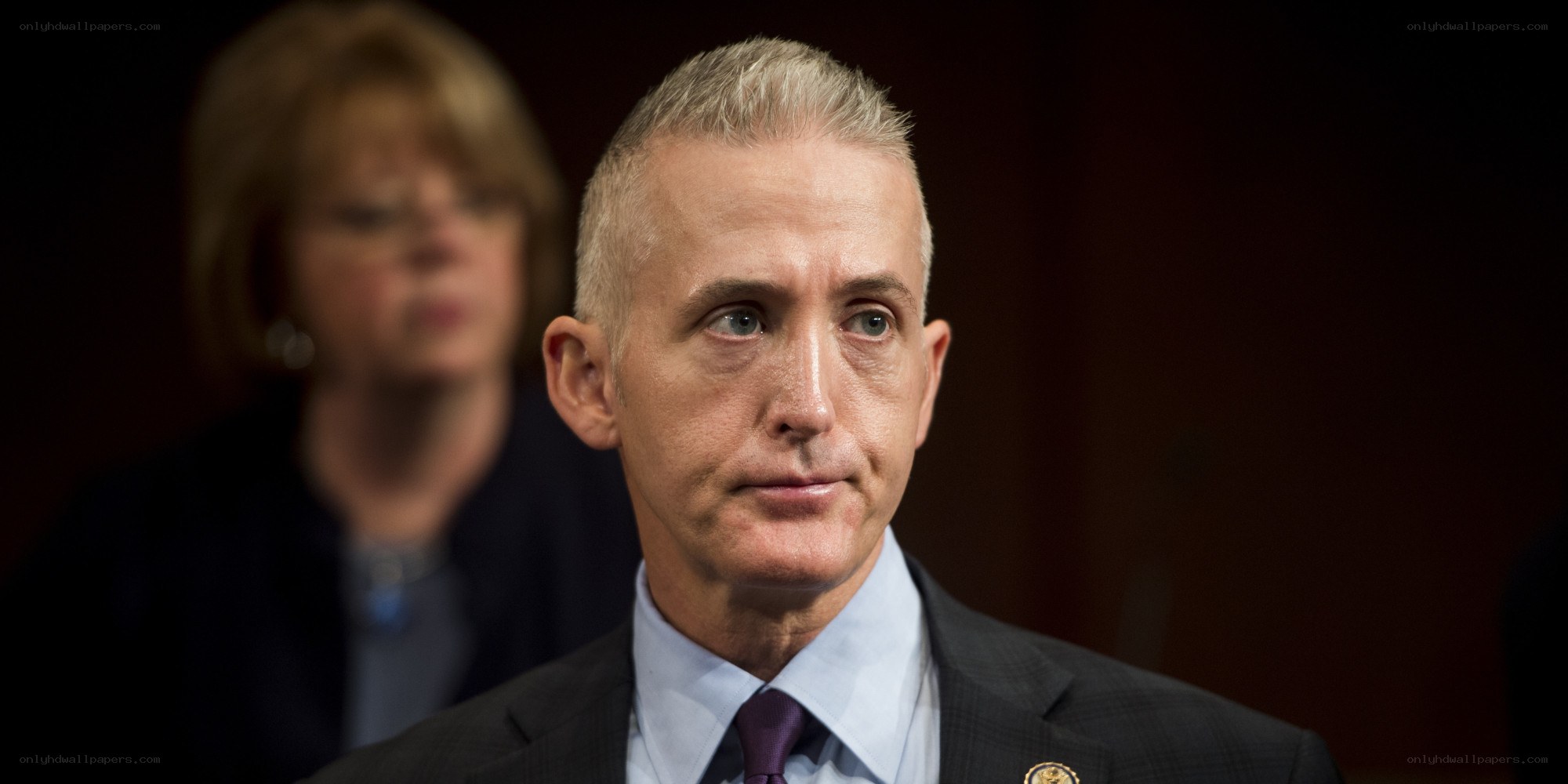man in suit at hearing