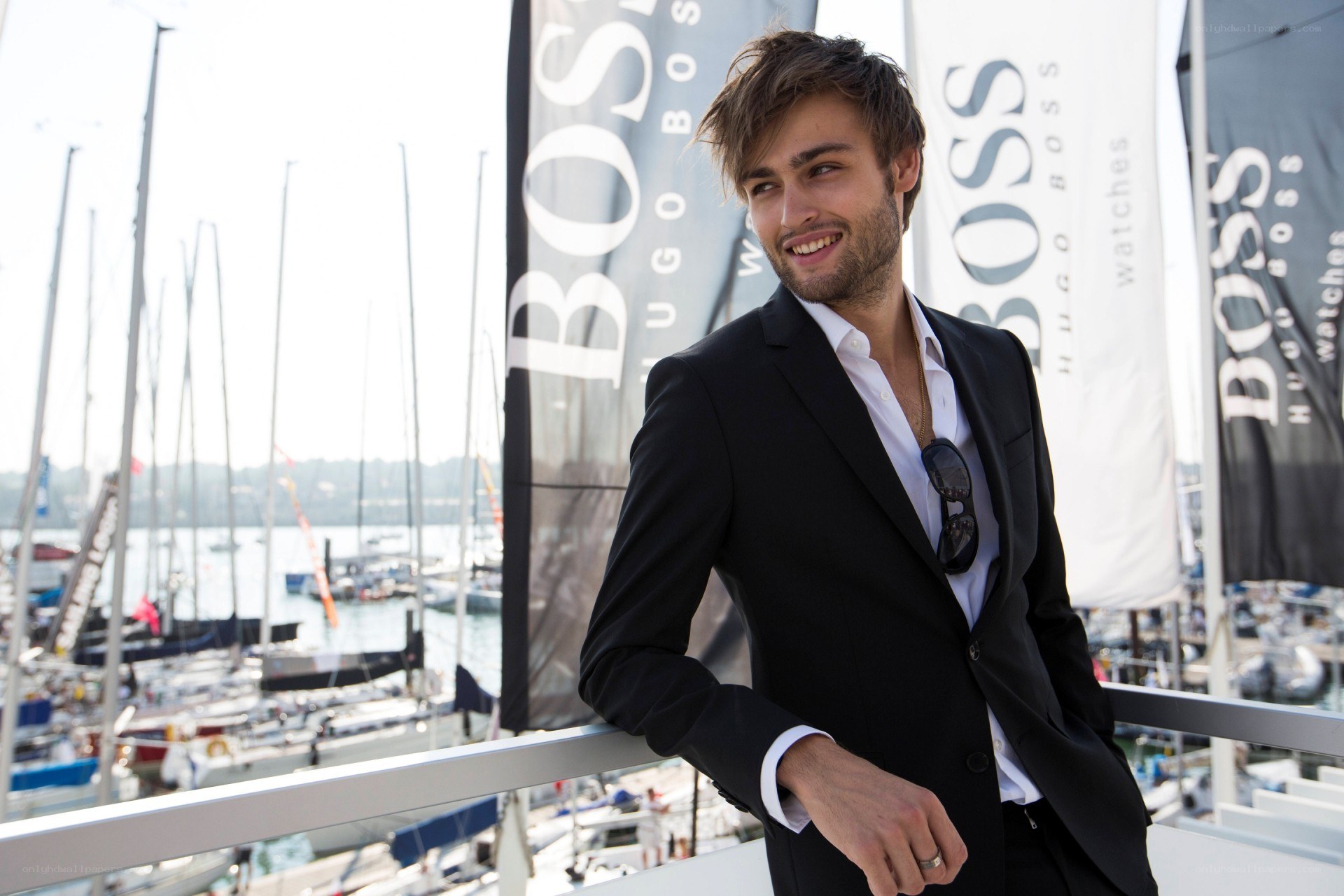 Man in suit at marina