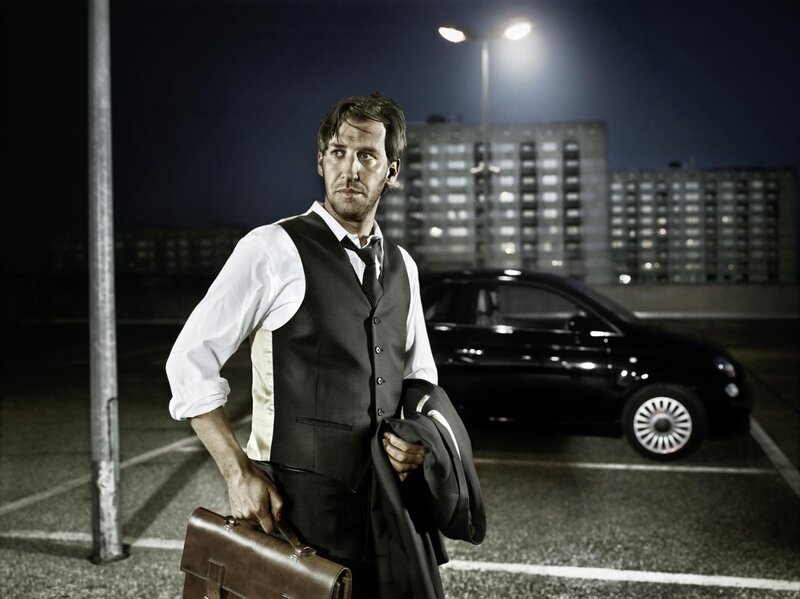 man in suit at night