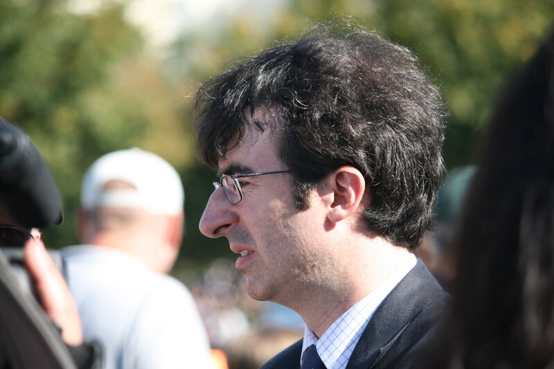 man in suit at outdoor event
