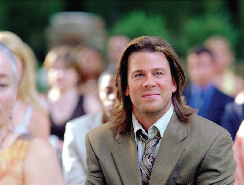 Man in suit at outdoor event