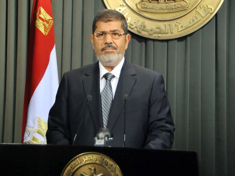 Man in Suit at Podium