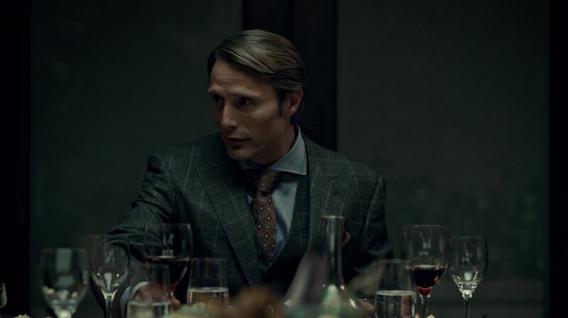 Man in Suit at Table — Gray