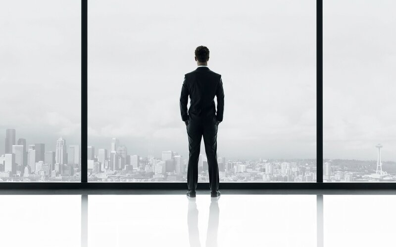 Man in Suit at Window — Black