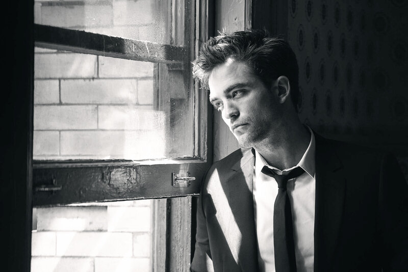 Man in Suit by Window — Black, Dramatic