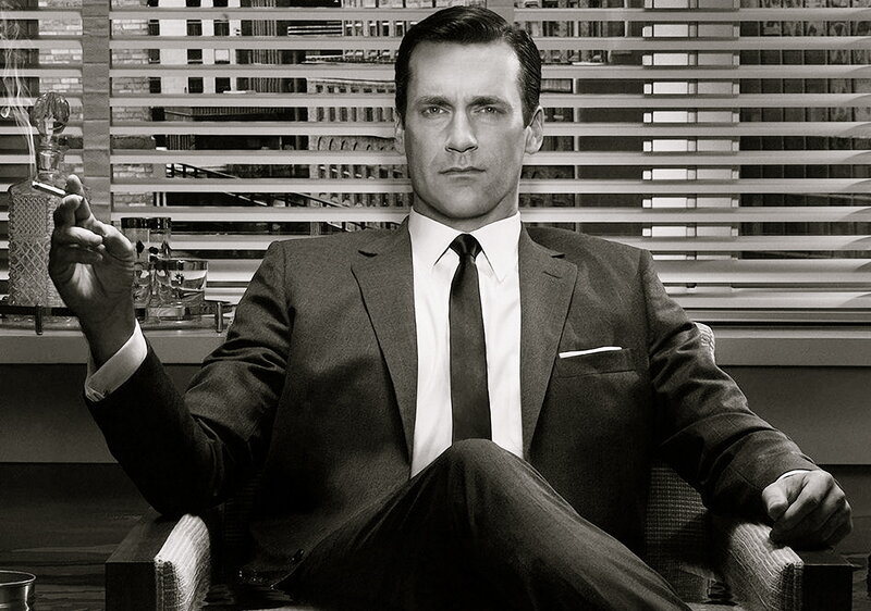 Man in Suit Holding Cigarette — Black, Serious