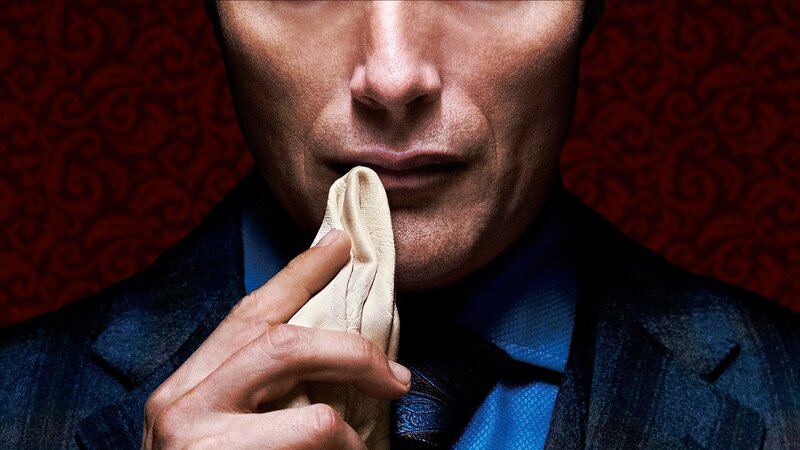Man in Suit Holding Cloth