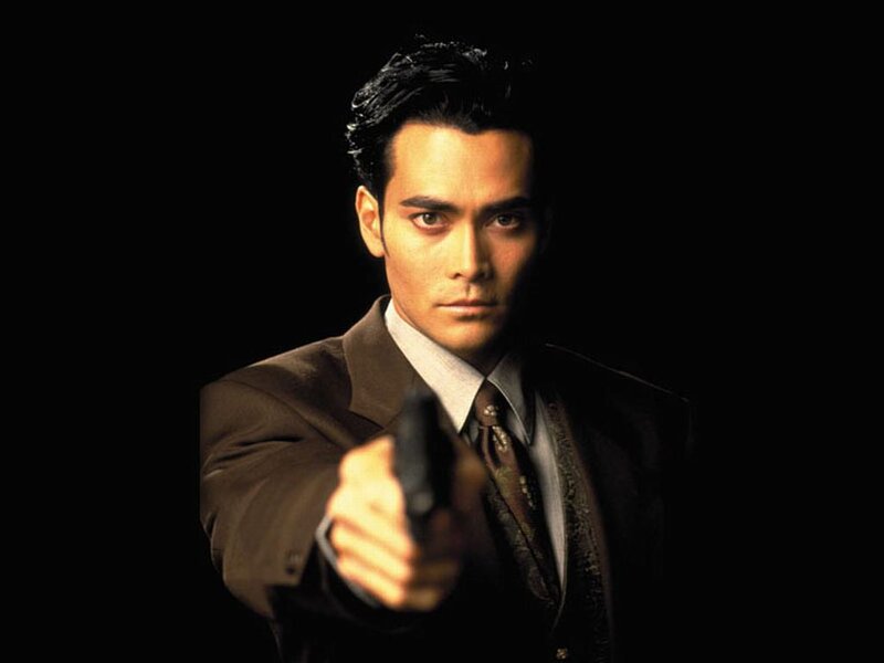 Man in Suit Holding Gun — Black, Dramatic, Photograph, Tie