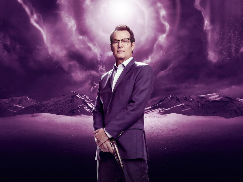 Man in Suit Holding Gun — Purple, Dramatic, Photograph