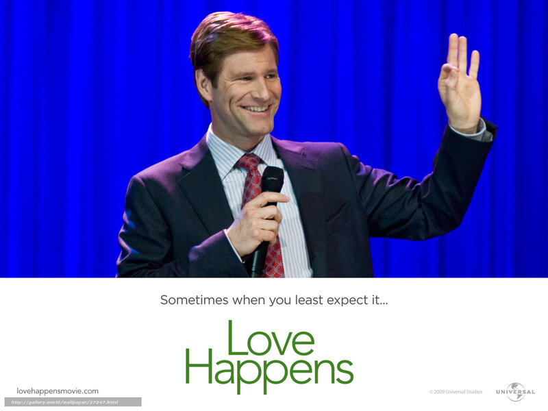 Man in Suit Holding Microphone