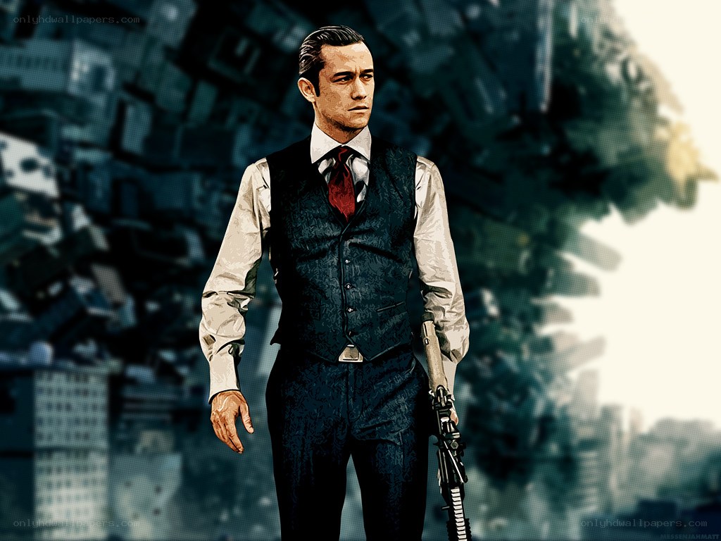 man in suit holding rifle