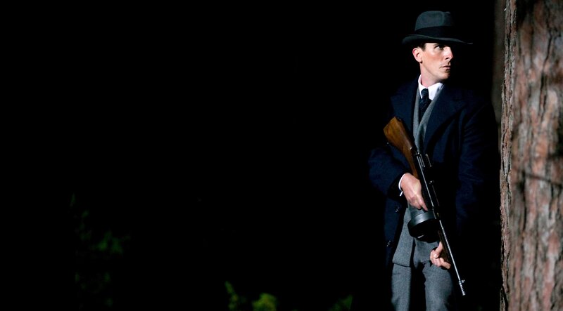 Man in Suit Holding Rifle — Black