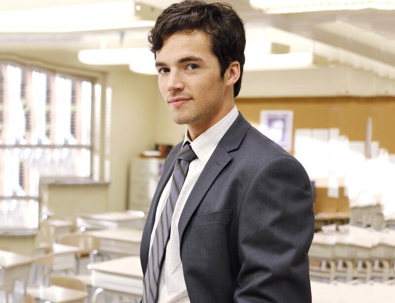 Man in Suit in Classroom