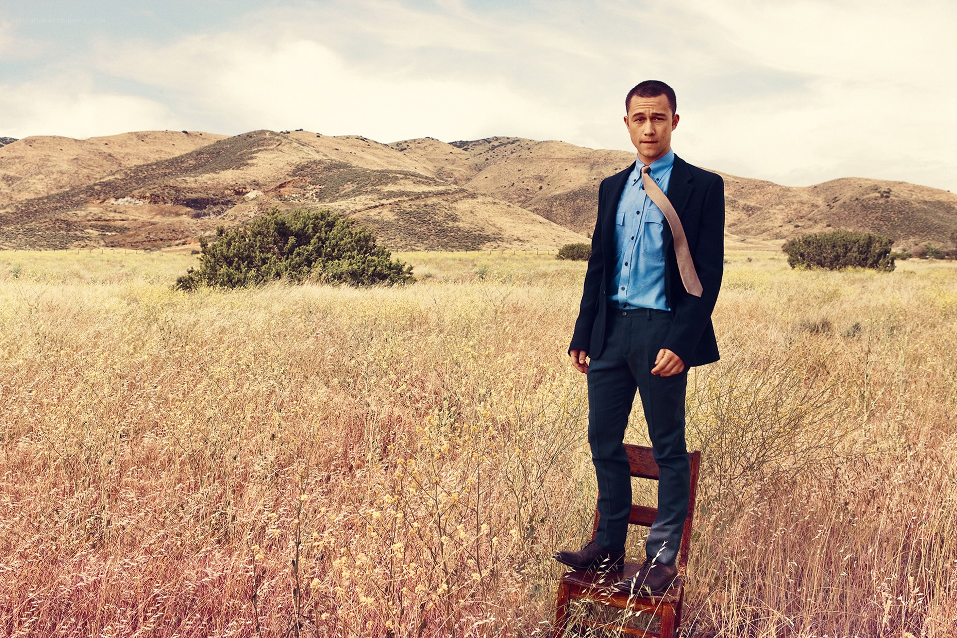 man in suit in field