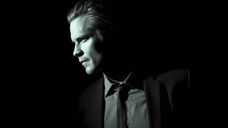 man in suit in profile
