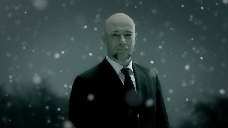 man in suit in snow
