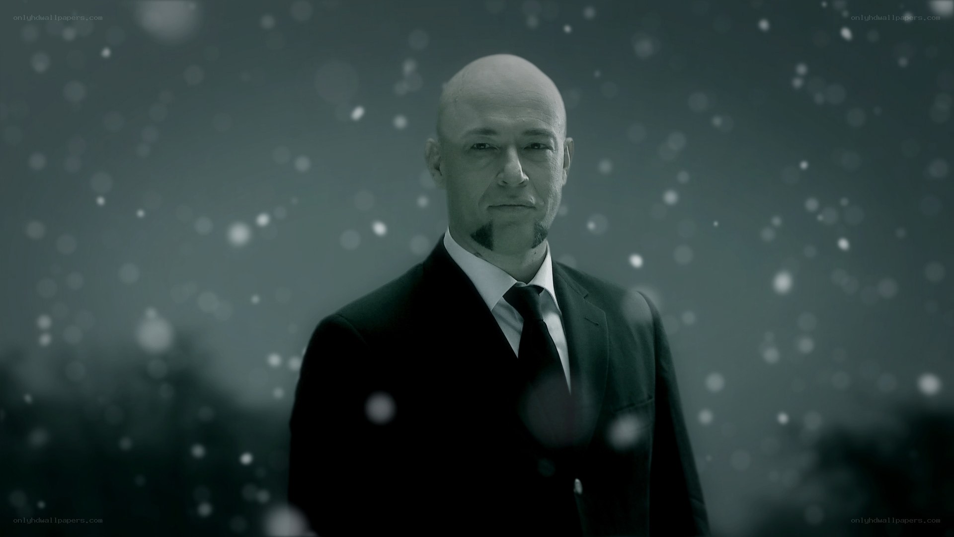 man in suit in snow