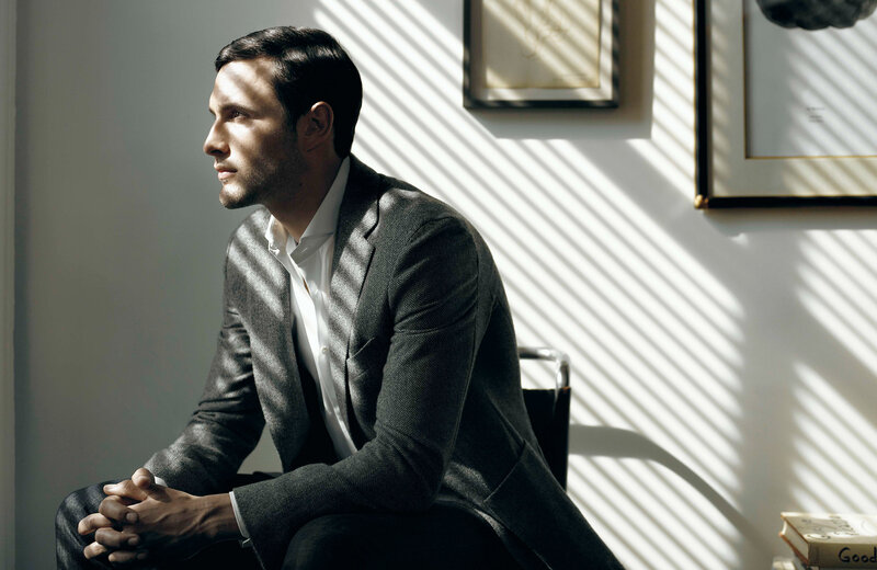 man in suit in sunlit room