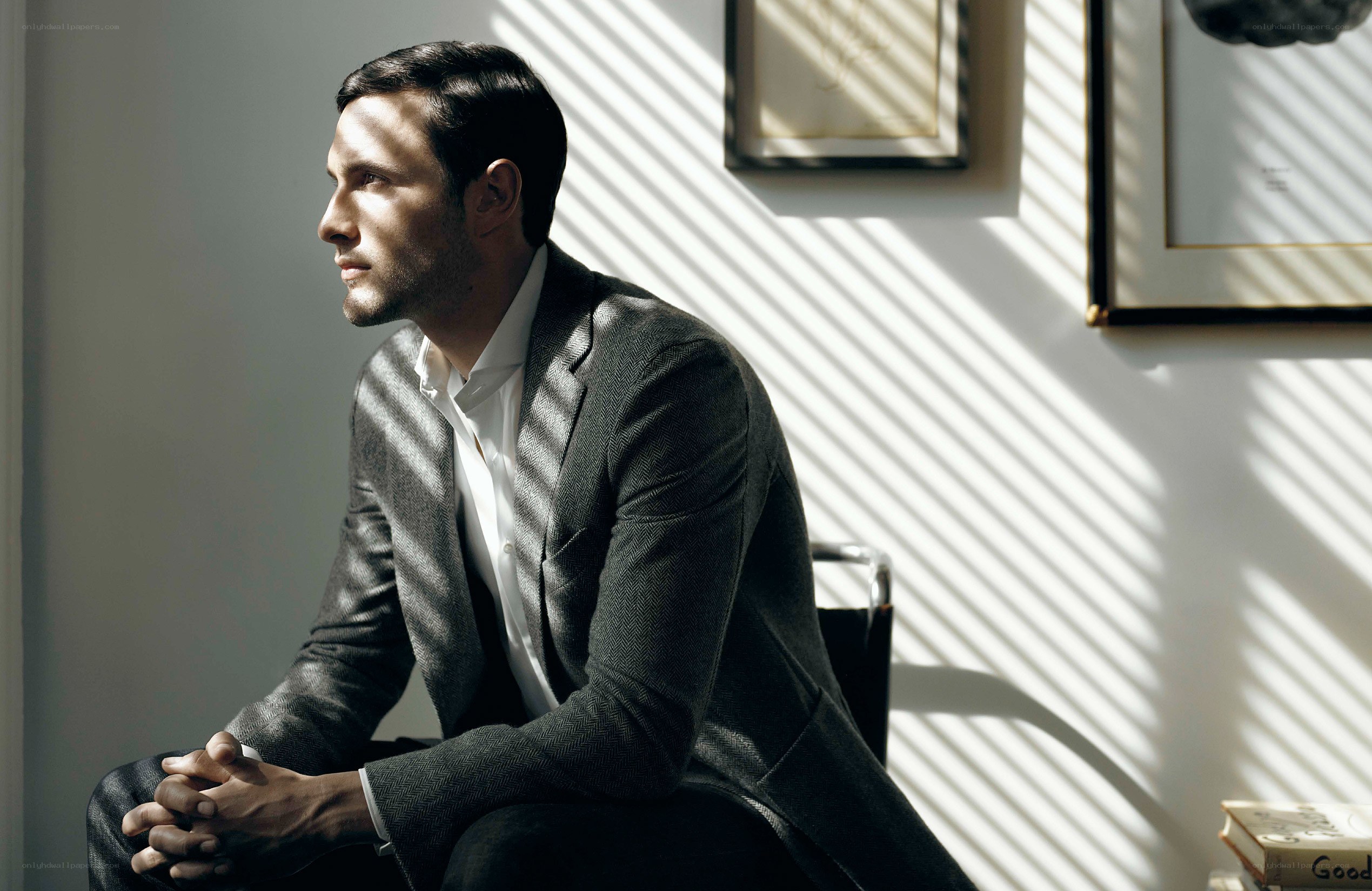 man in suit in sunlit room