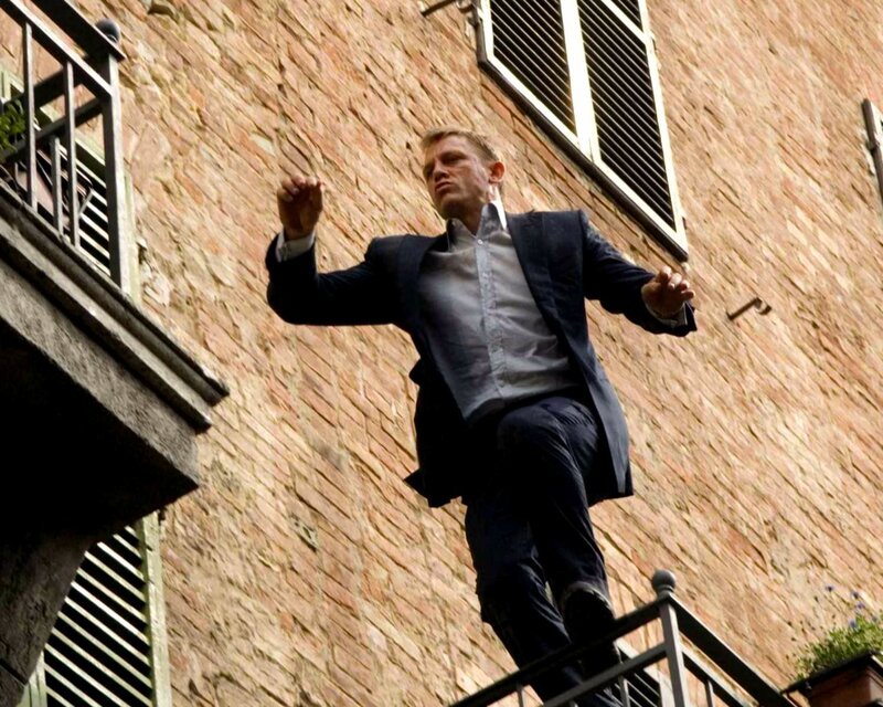 Man in Suit Jumping — Brown
