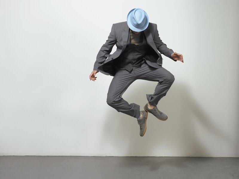 Man in Suit Jumping