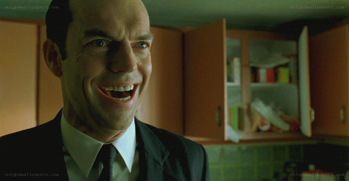 man in suit laughing