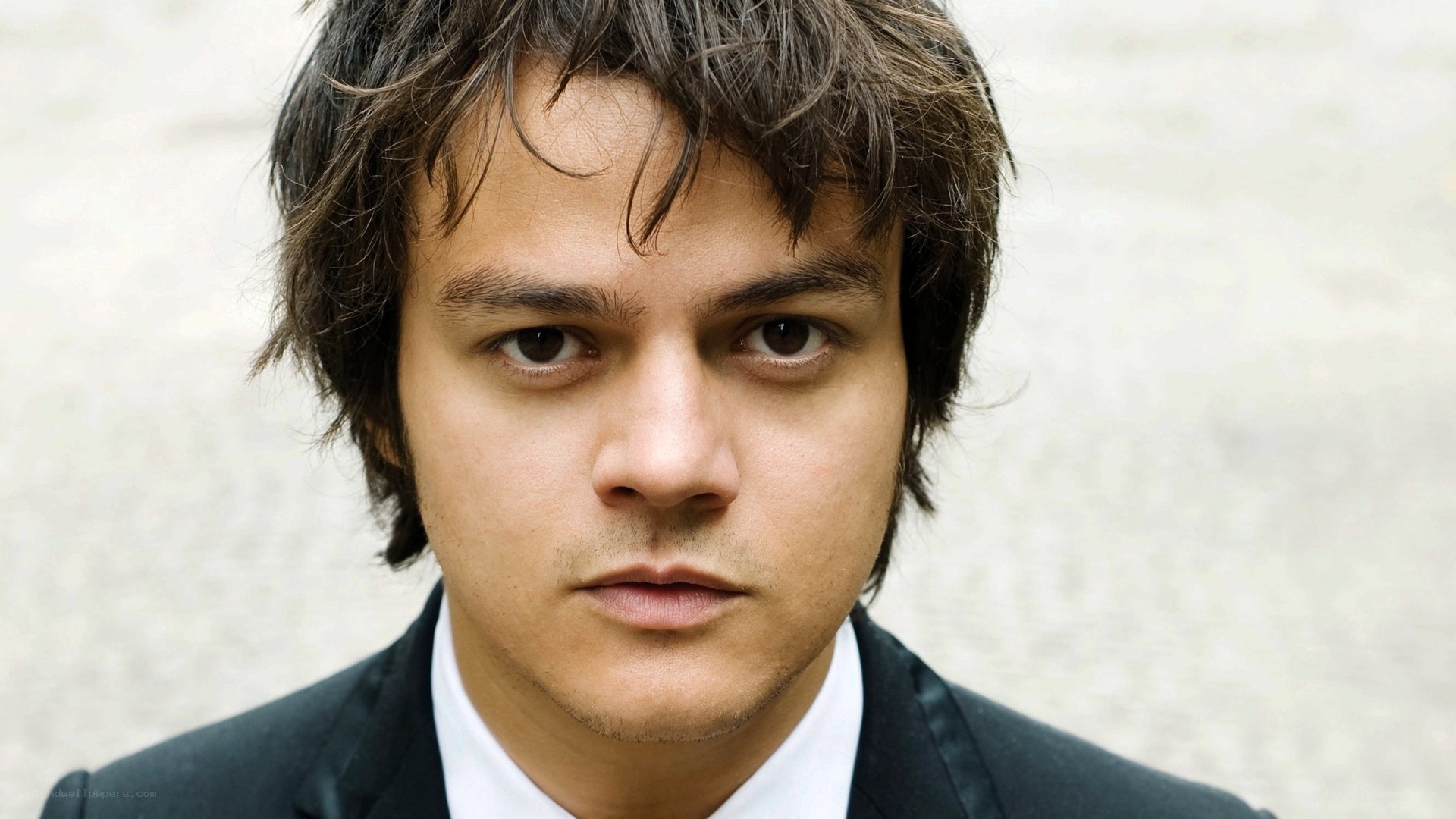 man in suit looking at camera
