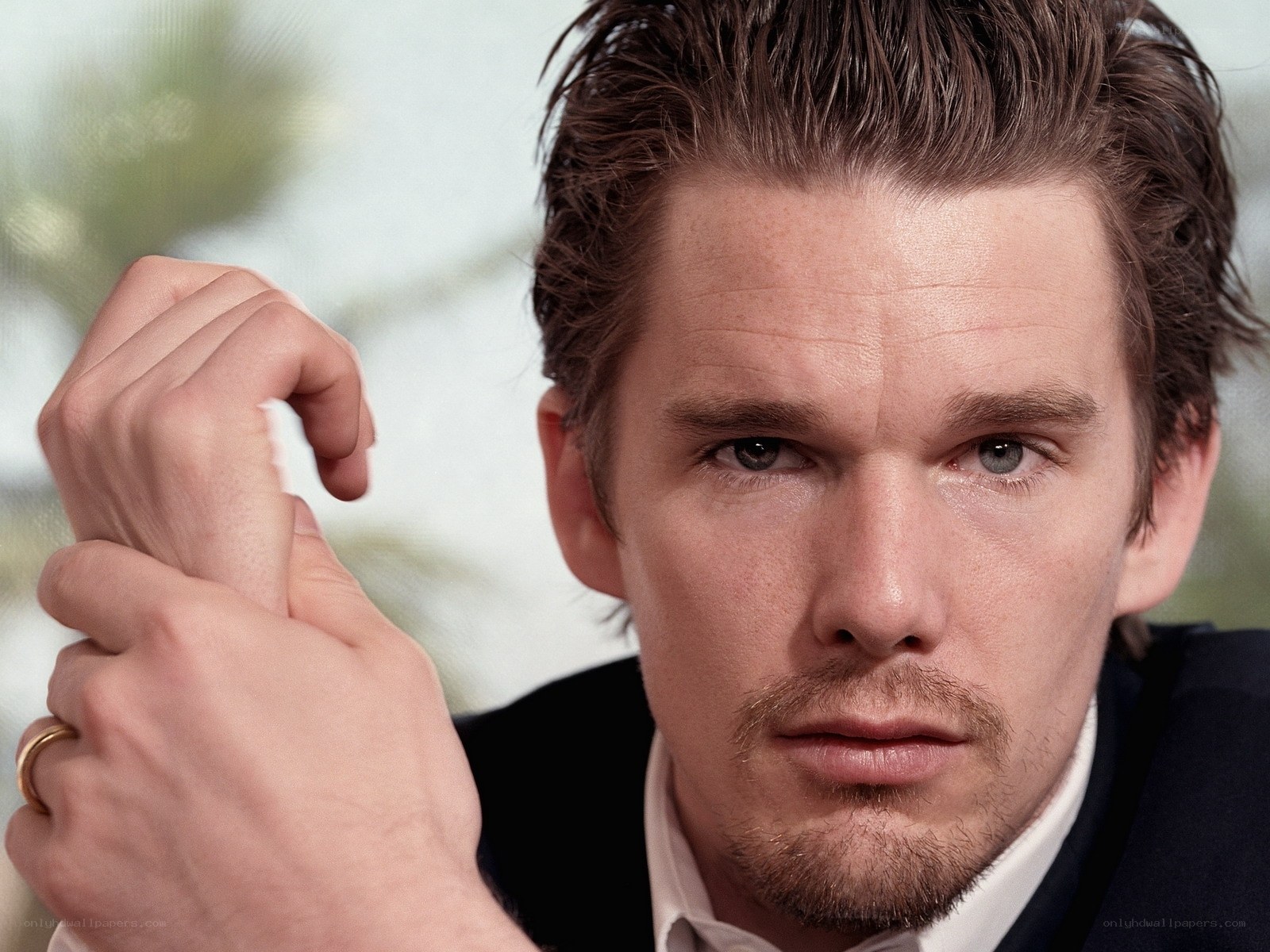 man in suit looking at camera