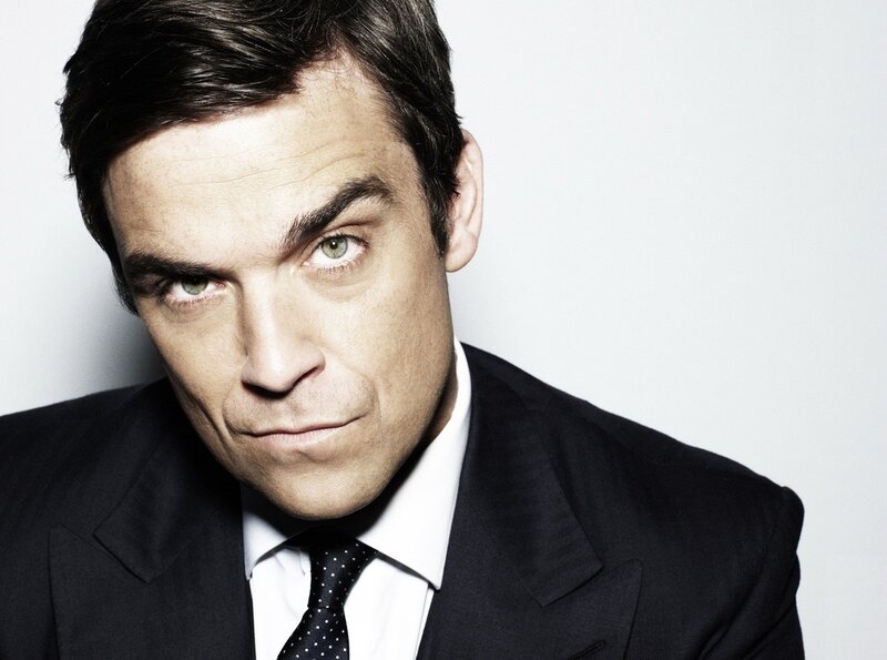 man in suit looking at camera