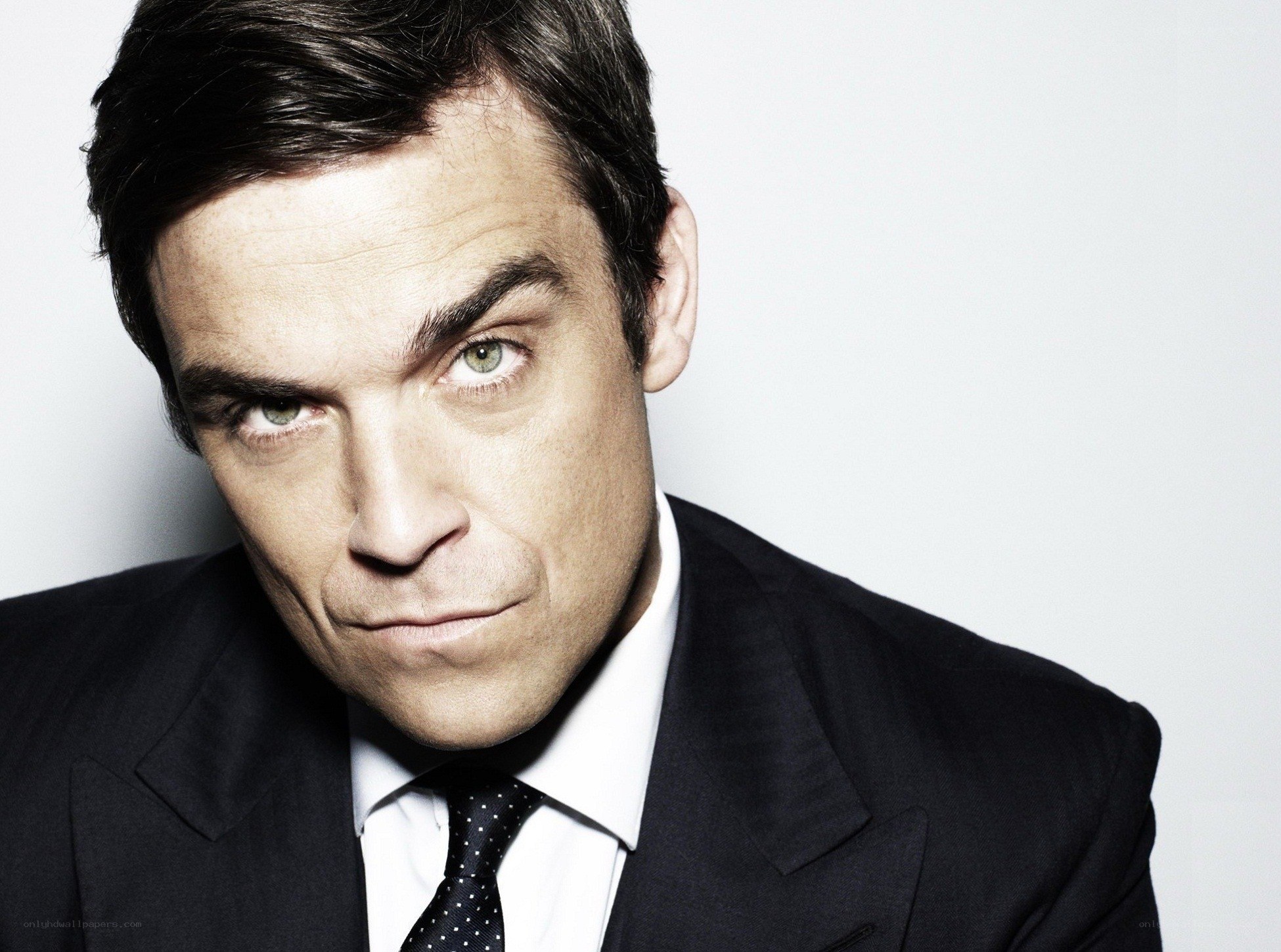 man in suit looking at camera