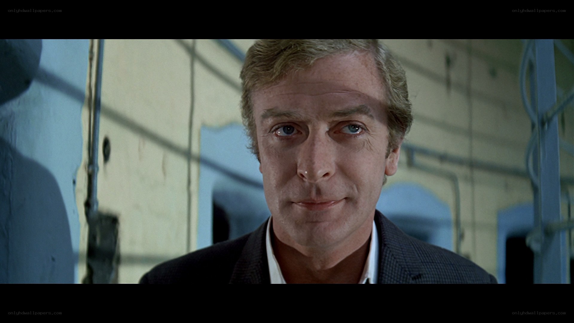 man in suit looking at camera