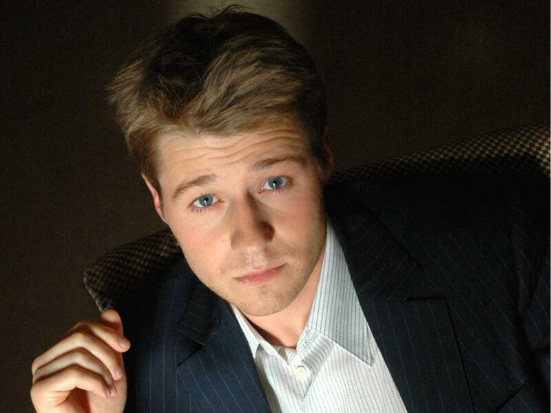 Man in Suit Looking at Camera — Black