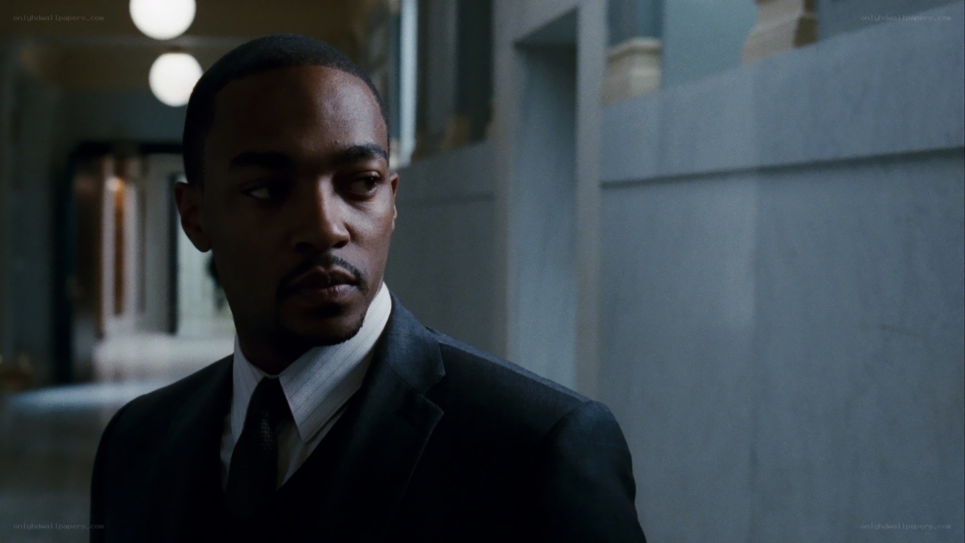 man in suit looking away