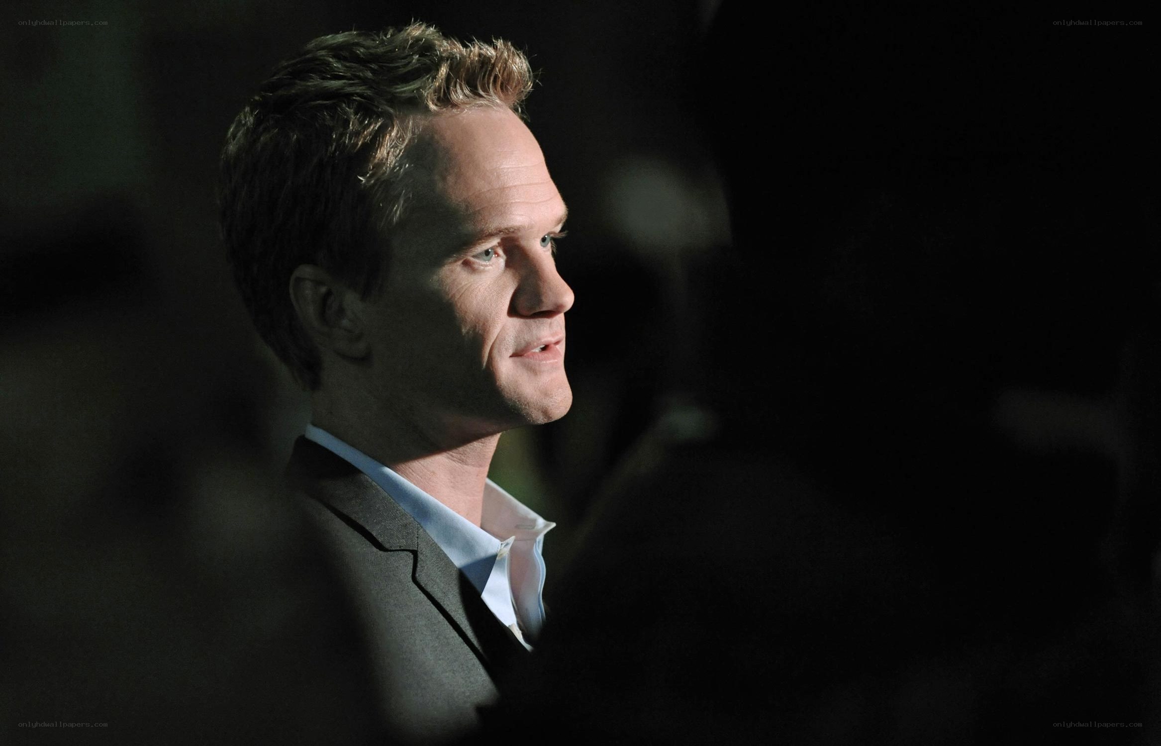 man in suit looking away